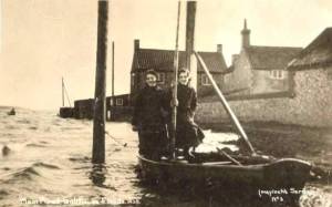 Madge and Kathleen Haylock tied to a telegrapg pole